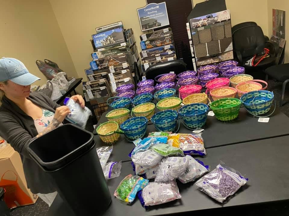 Guardian team putting Easter baskets together