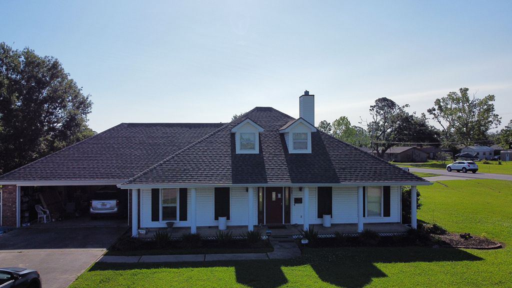 Full reroof after storm damage after