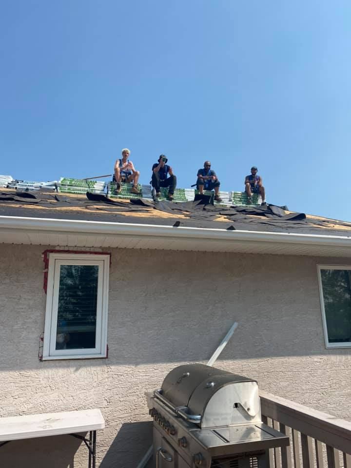 Guardian crew repairing a roof
