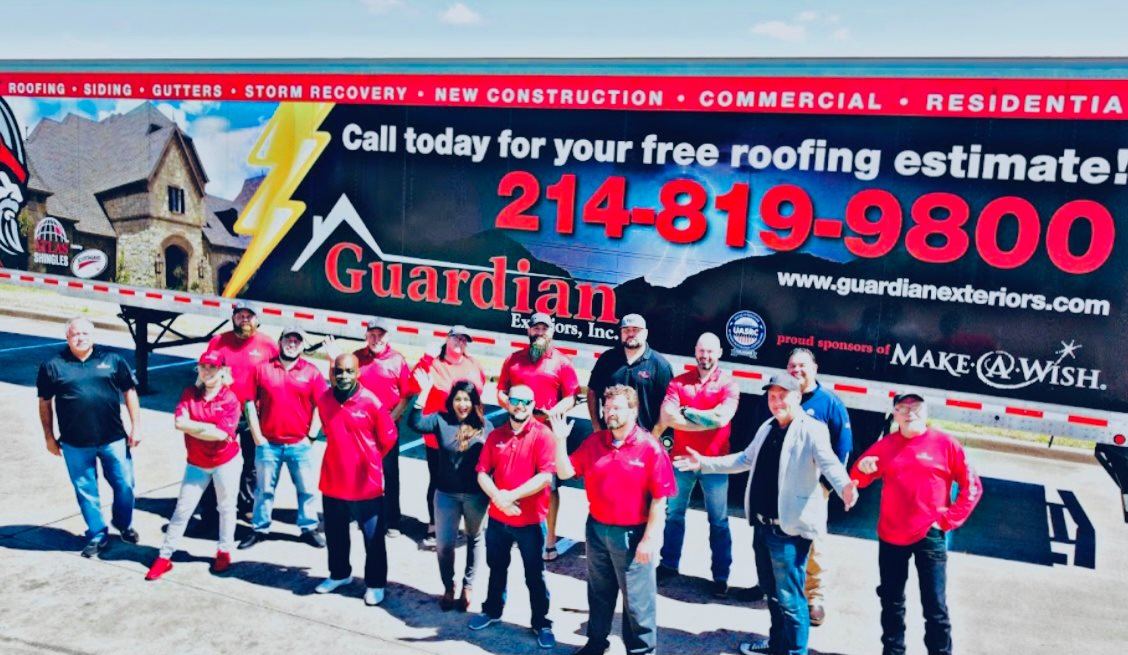 The Guardian Exteriors team in front of a company truck